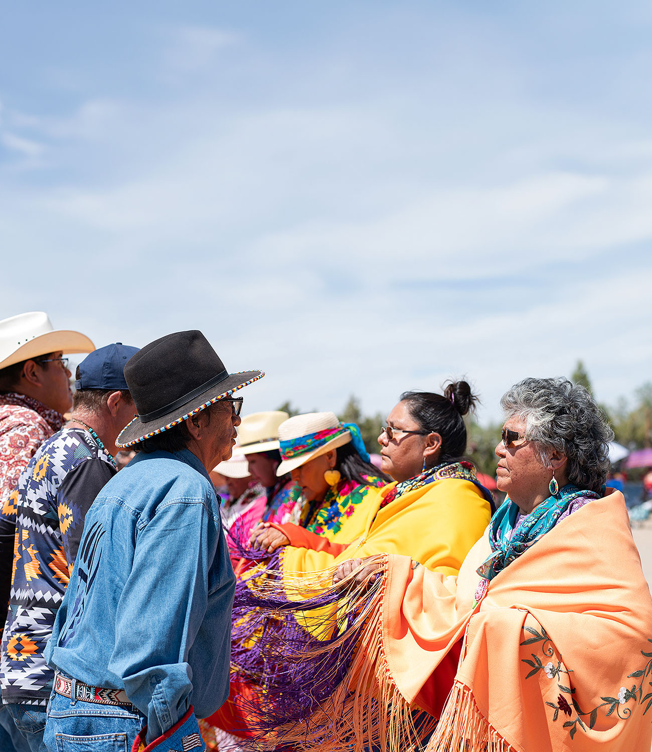 Ute Mountain Ute Bear Dance Chief, Terry Knight Sr. and Southern Ute tribal elder, Ramona Eagle dance together for a line dance
