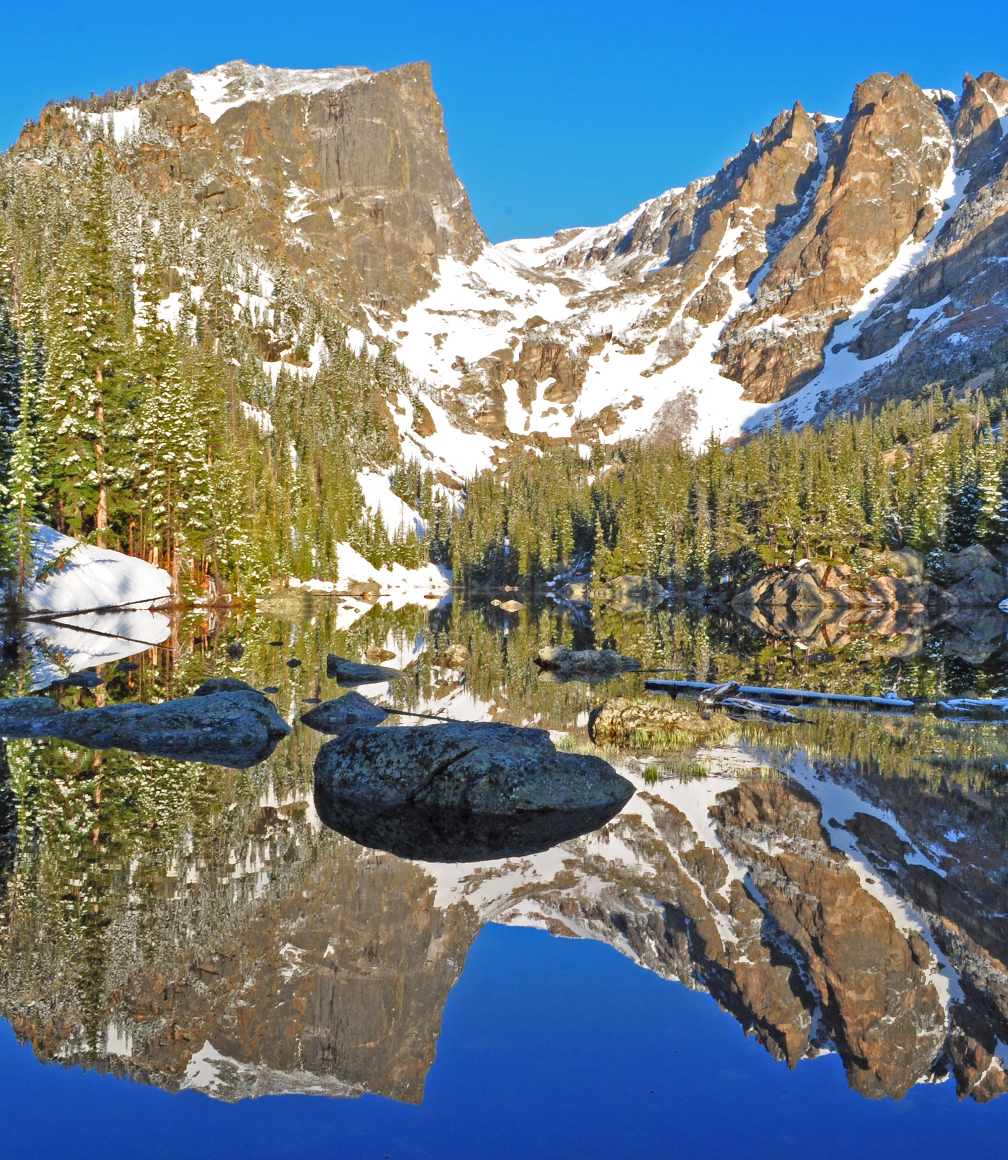 Hallett Peak reflected in the water of Dream Lake in Rocky Mountain National Park