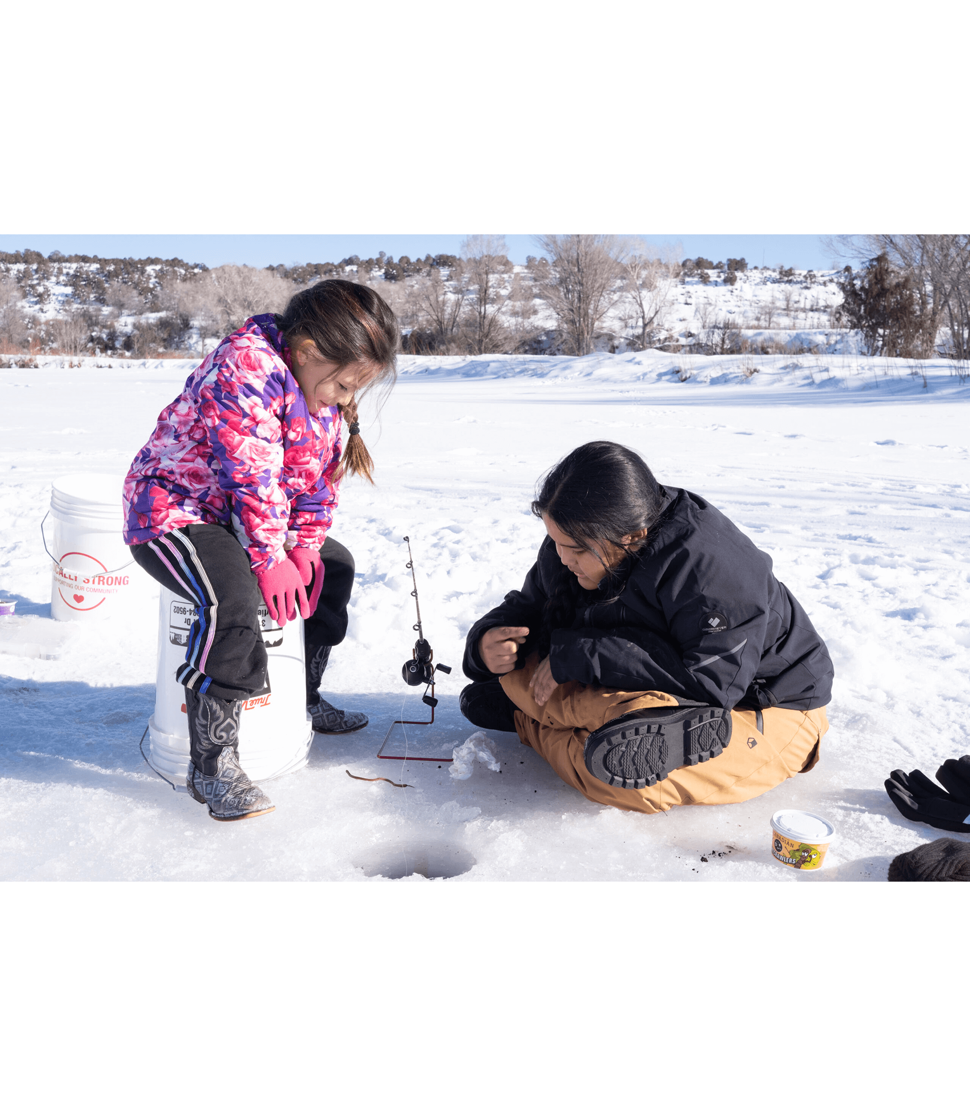 Southern Ute Indian Montessori Academy students fishing on Scott’s Pond