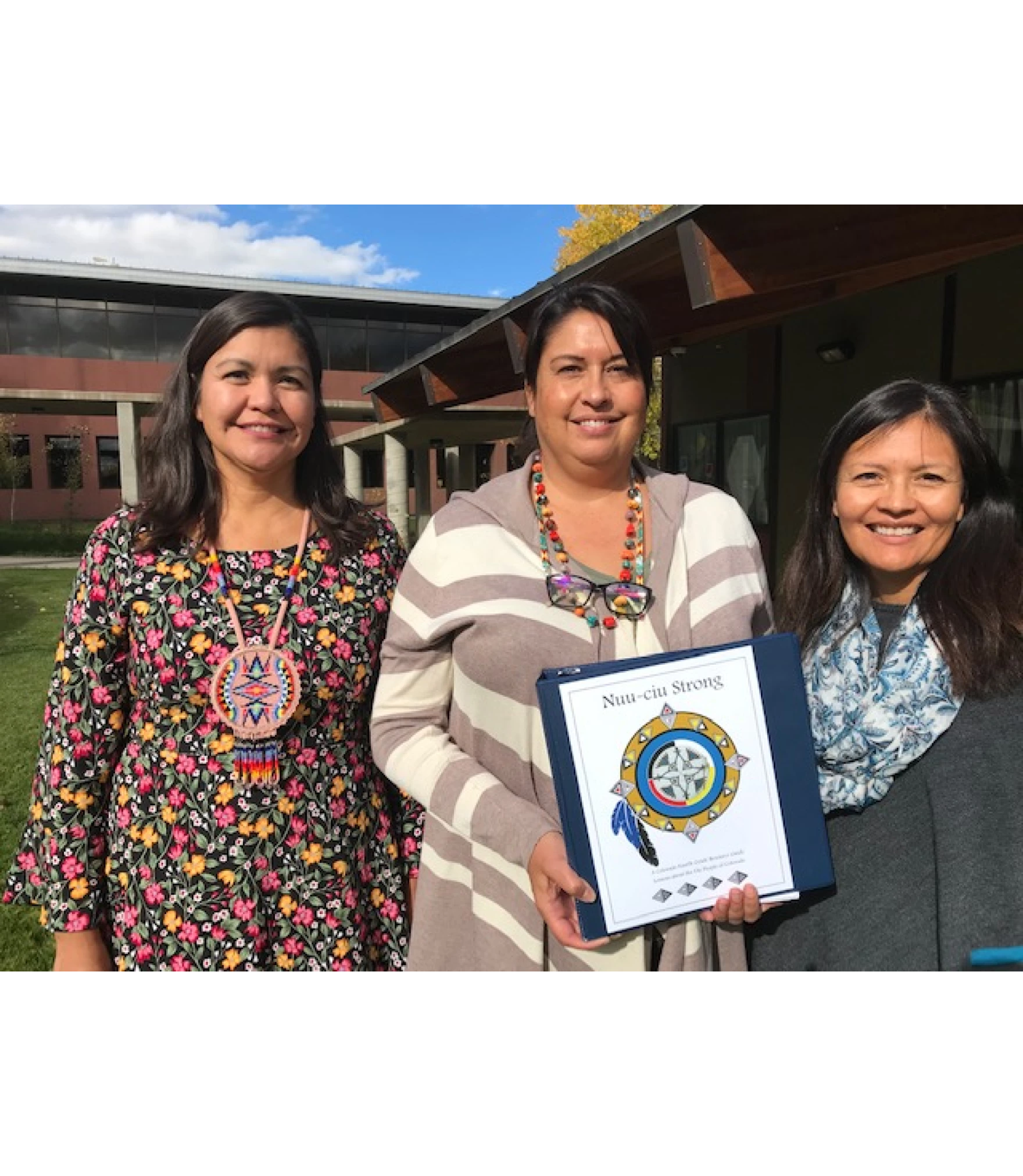 LaTitia Taylor, Education Director from the Southern Ute tribe, and members of the tribe's "Nuu-ciu Strong"